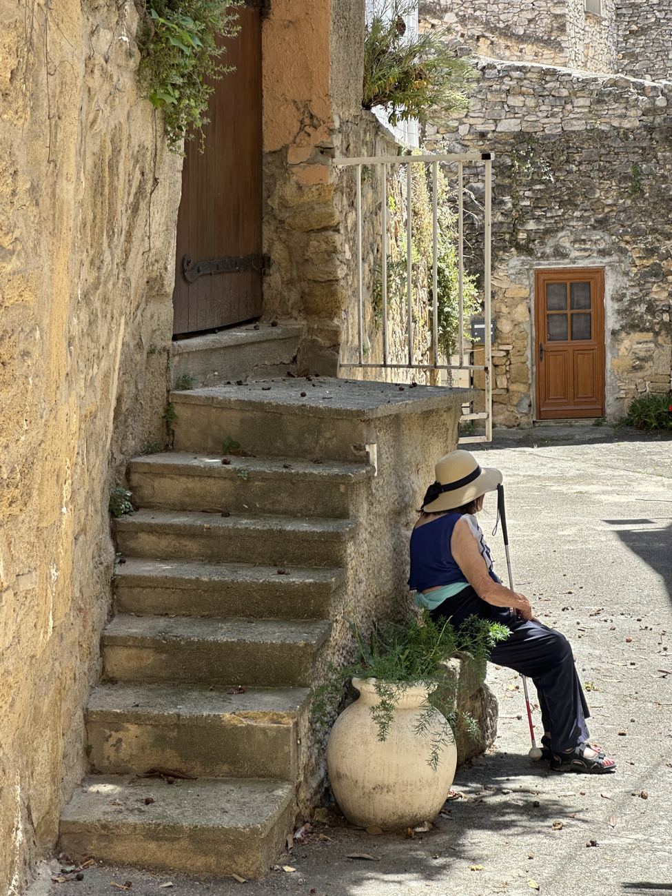 Worn stone steps climbing between village houses